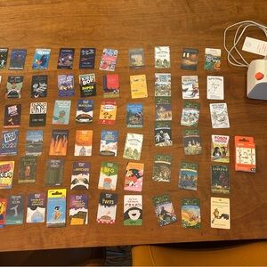 Yoto player + more than 70 cards + card case